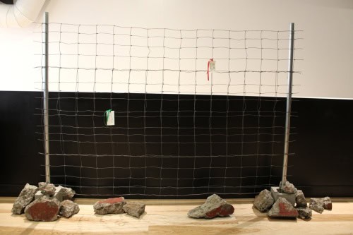 Messages of Hope and  Resistance, 2025, Metal, fence, rocks, cement, canvas, ribbon, ink, and wire,  72 by 96 by 12 inches