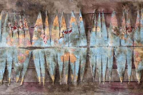 "A Location Near You" 2014, Encaustic, charcoal, oil paint, globe, paper and push pins collage on wood, 24 by 48 inches