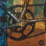 Colorful collage painting of a bicycle's gears with blue, orange, and yellow paint and found metal objects.
